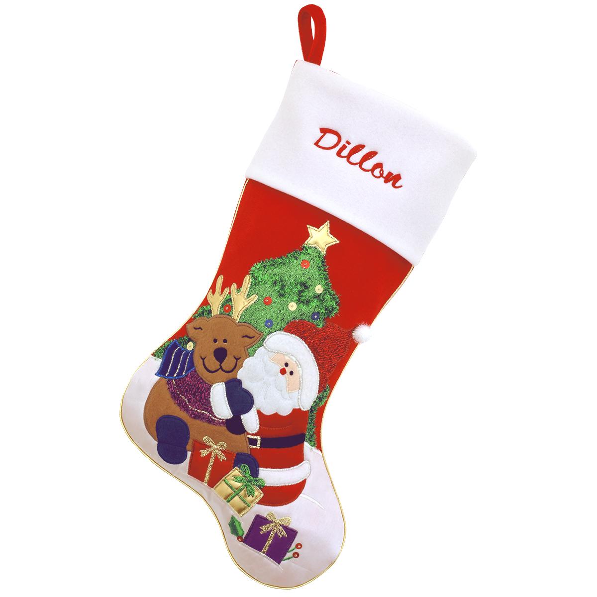 Santa and reindeer in front of a Christmas tree on a personalized red velvet stocking with white cuff.