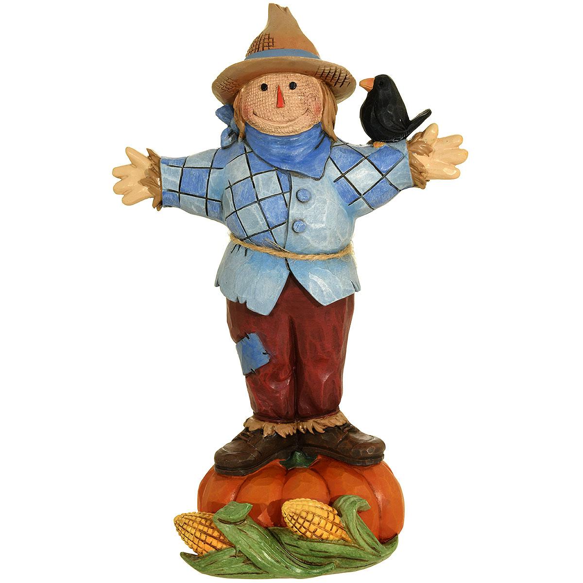 Scarecrow Standing On Pumpkin