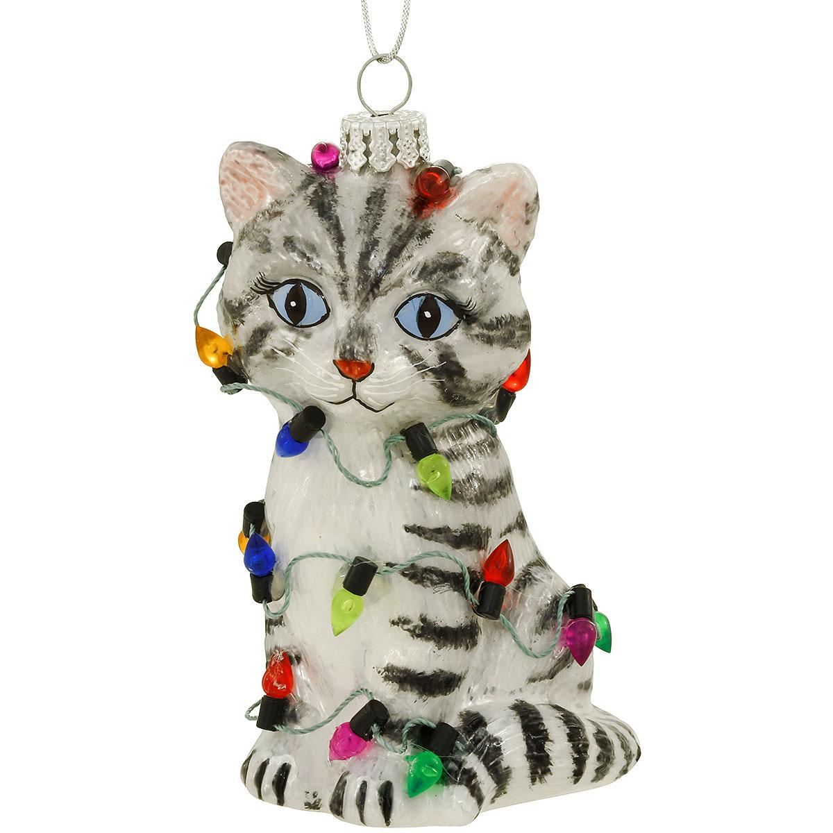 Grey tabby cat wrapped in lights glass ornament