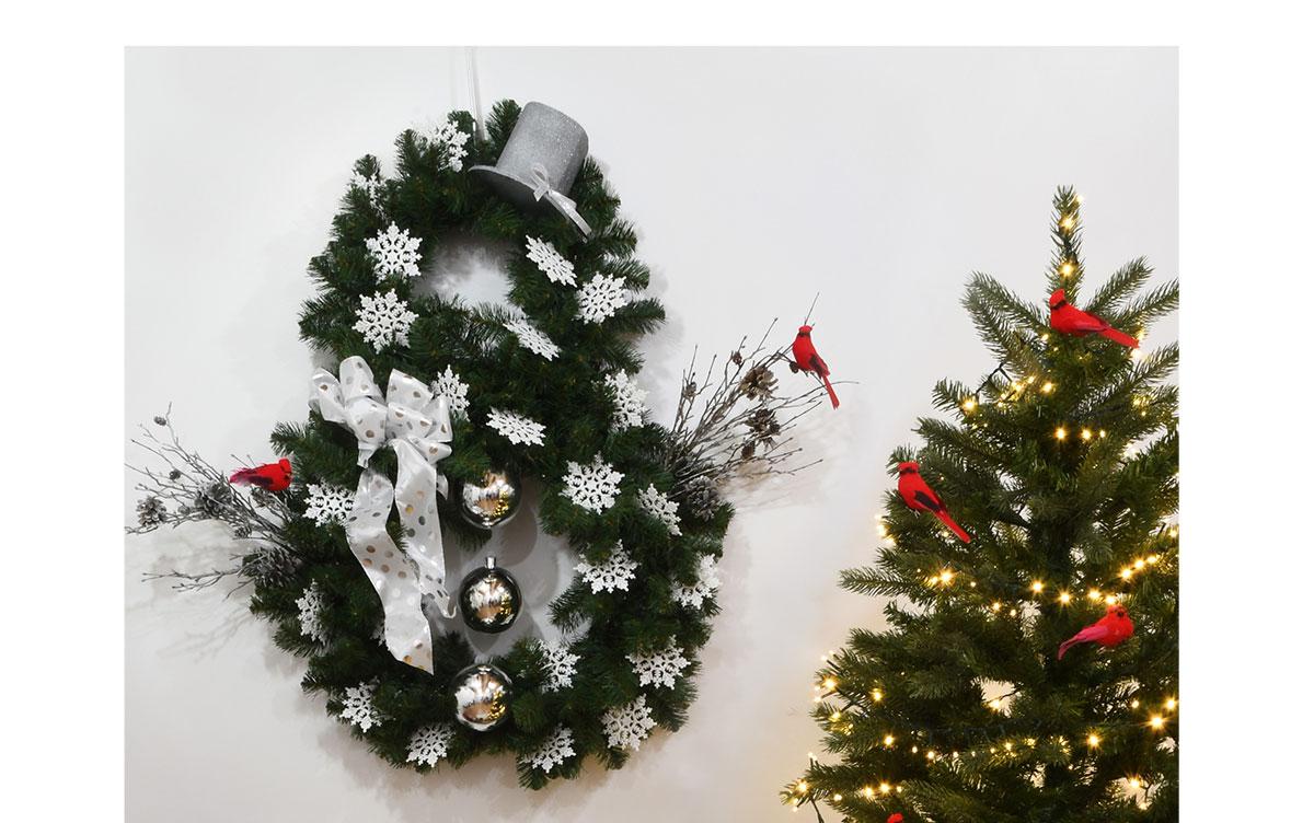 Shop Wreaths & Swags | A snowman shaped wreath that's festivaly decorated
