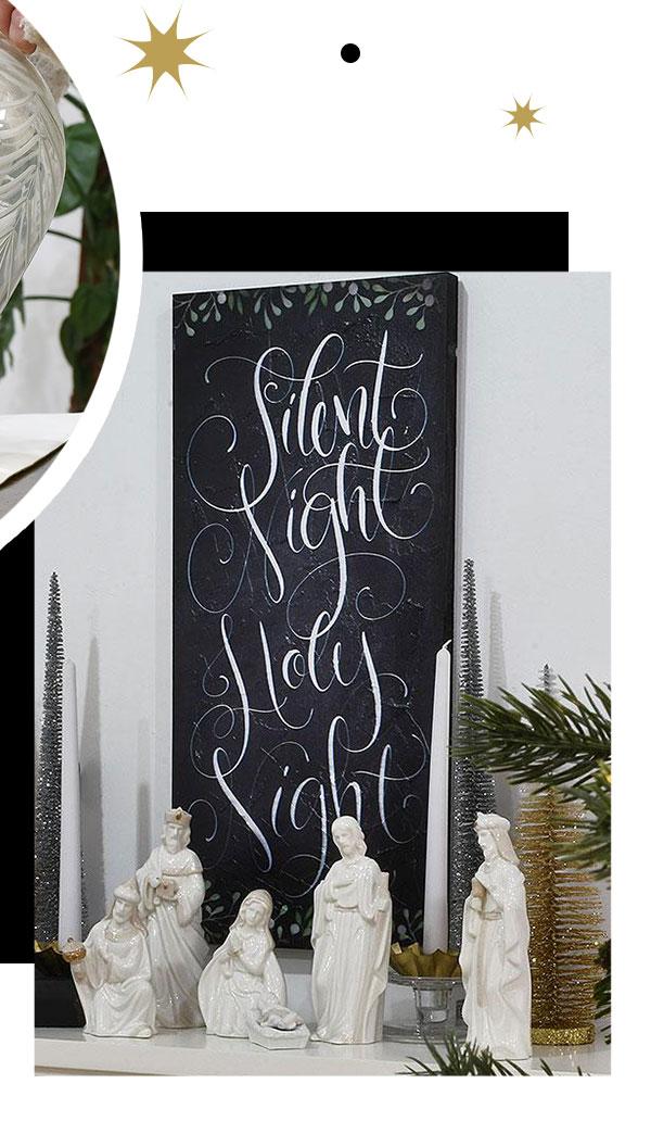 Silent Night Wall Art hung on the wall and on display with an elegant nativity set